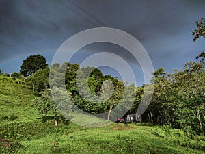 Rainbow over a little white house in Tiradentes, Minas Gerais, Brazil.