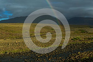 Rainbow over the mountain tundra.