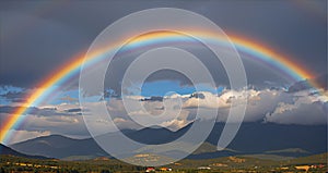 Rainbow Over Mountains, Natures Colorful Show photo