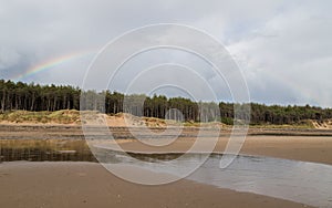 Rainbow over Newborough pinewood