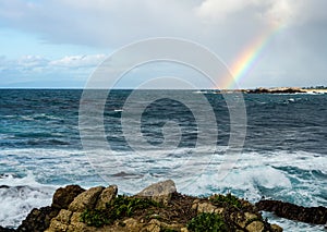 Rainbow over ocean near Pebble beach,Monterey Peninsula, California, USA