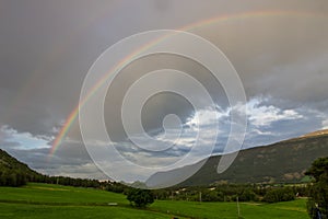 Rainbow over Oppland in Norway photo