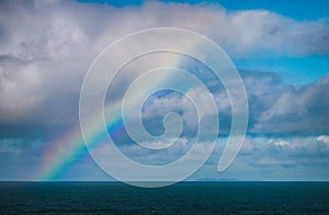 A rainbow over the Pacific Ocean and Farallon islands photo