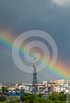 Rainbow over a petrochemical plant