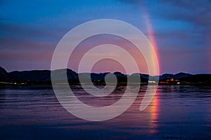 Rainbow over red fishermans village