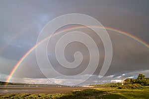 Rainbow Over River