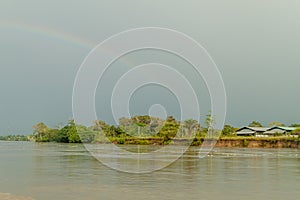 Rainbow over river Napo photo
