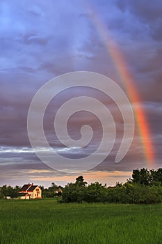 Rainbow over rural Village