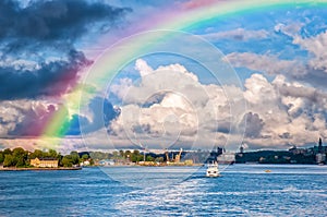 Rainbow over sea bay in Stockholm, Sweden