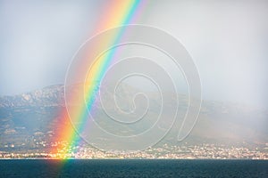 Rainbow over the sea and mountain