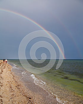 Rainbow over the sea after the rain on the island of Dzharylhach