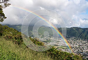 Rainbow over the suburbs of Woodlawn and Manoa in Honolulu, Oahu