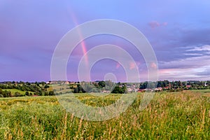 Rainbow over the summer field