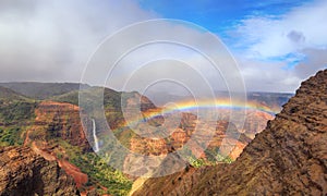 Rainbow over Waimea Canyon photo