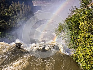 Rainbow over waterfall