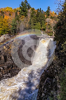 rainbow over waterfalls