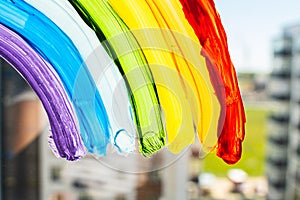 A rainbow painted on a window. Gay Colours, spectrum