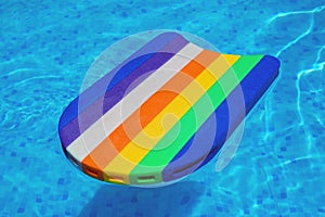Rainbow pattern styrofoam swimming board baseboard floating in p