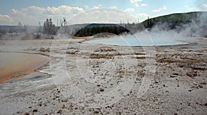 Rainbow Pool hot spring and Sunset Lake geyser in Black Sand Basin in Yellowstone National Park in Wyoming USA