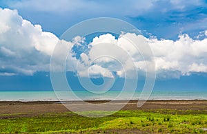 Rainbow after the rain over the sea, freshness of nature