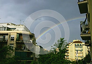 Rainbow after the rain in the sky of Barcelona photo
