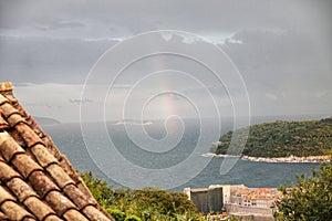 Rainbow and rain view at sea at Dubrovnik Croatia