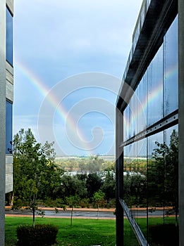 Rainbow with refection in office window