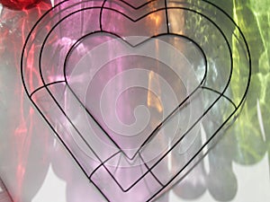 Rainbow reflections, wire heart frame