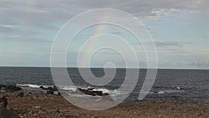 Rainbow from the sea Aruba island in the caribbean