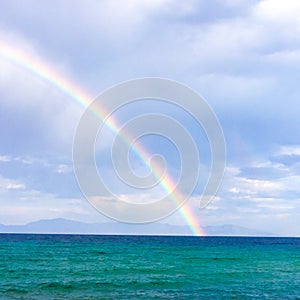 Rainbow on the sea in Greece view on Thassos island