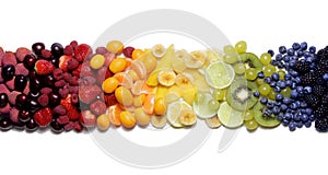 Rainbow fruits selection colorful in a white background photo