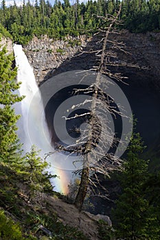 Rainbow shining at Helmcken Falls in Wells Gray Provincial Park near Clearwater, British Columbia, Canada Helmcken Falls is a 141