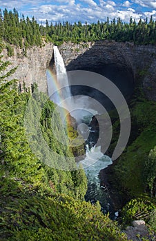 Rainbow shining at Helmcken Falls in Wells Gray Provincial Park near Clearwater, British Columbia, Canada Helmcken Falls is a 141