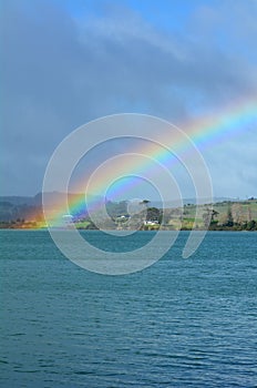 Rainbow in the sky and above the sea