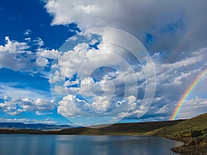Rainbow Sky by Lake