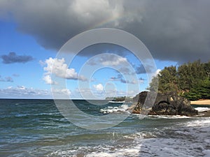 Rainbow in Sky Seen from Lumahai Beach on Kauai Island, Hawaii.