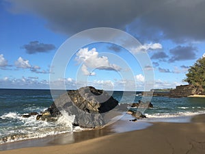 Rainbow in Sky Seen from Lumahai Beach on Kauai Island, Hawaii.