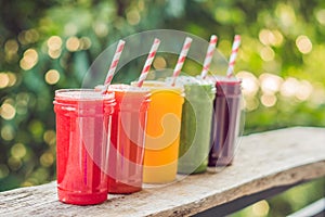 Rainbow from smoothies. Watermelon, papaya, mango, spinach and dragon fruit. Smoothies, juices, beverages, drinks variety with fre
