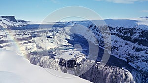 Rainbow, Snow, and Waterfalls of Gulfoss, Iceland