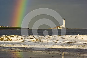 Rainbow at St. Marys Lighthouse near Newcastle photo