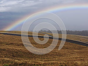 Rainbow and stormy clouds