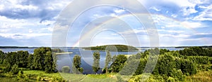 Rainbow in summer over lake in Belarus