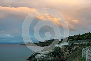 rainbow in a sunset over the sea