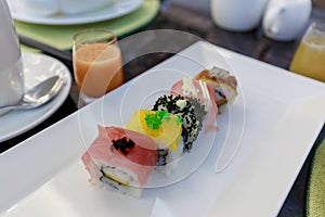 Rainbow Sushi Roll with salmon, eel, tun, royal prawn, caviar