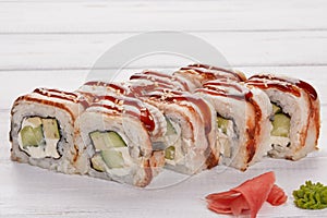 Rainbow Sushi Roll with salmon, eel, tuna, avocado, royal prawn, cream cheese Philadelphia, caviar, chukka. Sushi menu. Japanese f photo