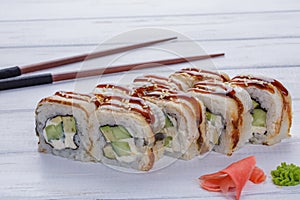Rainbow Sushi Roll with salmon, eel, tuna, avocado, royal prawn, cream cheese Philadelphia, caviar, chukka. Sushi menu. Japanese f photo