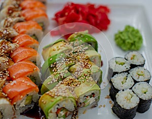 Rainbow Sushi Roll with salmon, eel, tuna, avocado, royal prawn, cream cheese Philadelphia, caviar tobica, chuka
