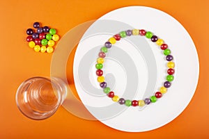 Rainbow swirl made from fruit-flavored colorful candy. Step by step instruction