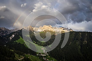 Rainbow after thunderstorm over Catinaccio Mountain