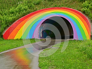 Rainbow tunnel Milne Hollow Don Valley with reflections on wet asphalt photo